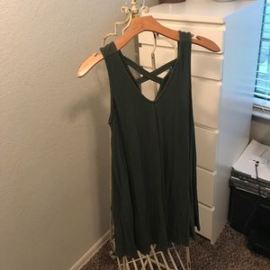 An olive green flowy t-shirt dress